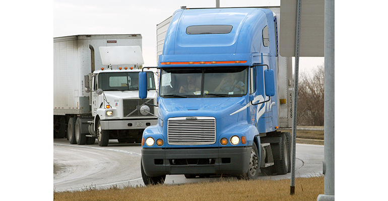 Refrigeratedtransporter 3726 Trucks On Roadway Tim Boyle Getty 0