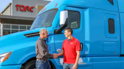 032919 Daimler shakes hands with Torc.jpg