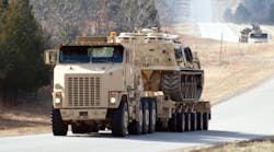 FMCSA estimates that more than 60,000 U.S. service members currently operate trucks, buses or other heavy equipment that is similar to units requiring a CDL for civilian operation. Shown here is a heavy equipment transporter from Fort Knox&rsquo;s 233rd Transportation Company.