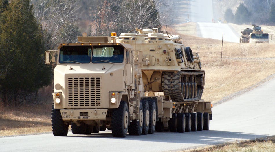 FMCSA estimates that more than 60,000 U.S. service members currently operate trucks, buses or other heavy equipment that is similar to units requiring a CDL for civilian operation. Shown here is a heavy equipment transporter from Fort Knox&rsquo;s 233rd Transportation Company.