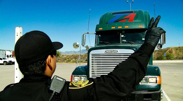 Customs has shifted 750 agents away from truck inspections, resulting in long waits at the border.