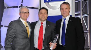 Nacarato Volvo vice president Joe Nacarato (center) receives the 2013 Volvo Trucks North American Dealer of the Year from (left) Terry Billings, Volvo Trucks vice president &ndash; business development and (right) G&ouml;ran Nyberg, president, Volvo Trucks North American sales &amp; marketing