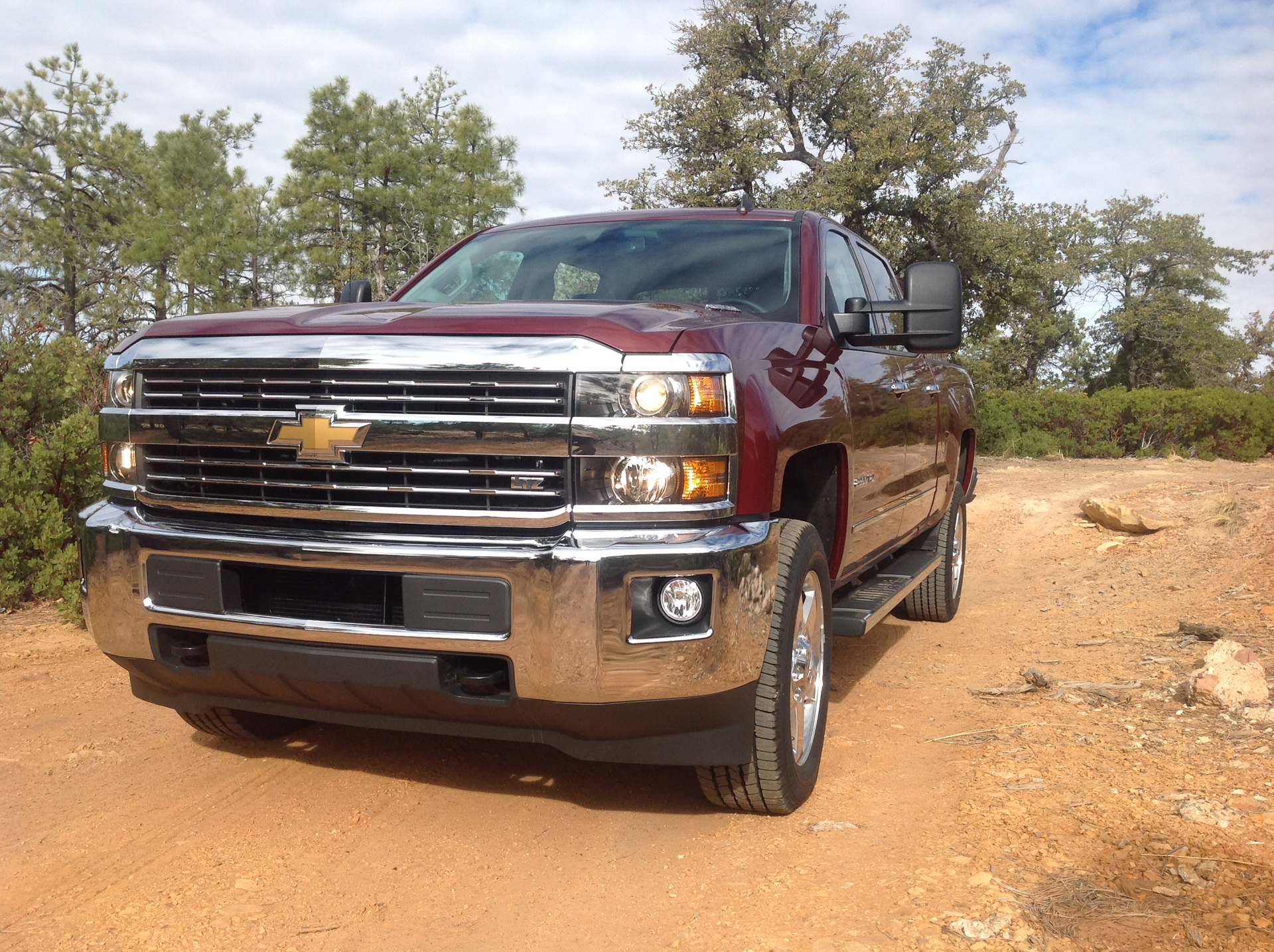Both the Chevy Silverado HD pictured and the GMC Sierra HD pickups for 2015 boast distinctive exterior styling that also contributes to vehicle efficeincy and cab comfort