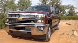 Both the Chevy Silverado HD (pictured) and the GMC Sierra HD pickups for 2015 boast distinctive exterior styling that also contributes to vehicle efficeincy and cab comfort.