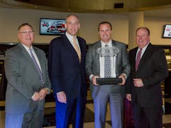 Jackson Group Peterbilt was named the 2013 North American Dealer of the Year by Peterbilt Motors Co Pictured from left to right Robert Woodall Peterbilt Director of Sales and Marketing Darrin Siver Peterbilt General Manager and PACCAR Vice President Blake Jackson Dealer Principal of Jackson Group Peterbilt and Peyton Harrell Peterbilt Director of Dealer Development Jackson Group Peterbilt was named the 2013 North American Dealer of the Year by Peterbilt Motors Co Pictured from left to right Robert Woodall Peterbilt Director of Sales and Marketing Darrin Siver Peterbilt General Manager and PACCAR Vice President Blake Jackson Dealer Principal of Jackson Group Peterbilt and Peyton Harrell Peterbilt Director of Dealer Development