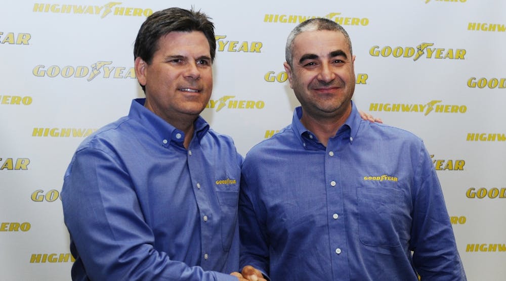 The 31st Goodyear North America Highway Hero Award winner, Ivan Vasovic, right, poses with Gary Medalis, marketing director, Goodyear Commercial Tire Systems. Vasovic rescued another trucker who had fallen from a burning tanker truck that was hanging over the side of a freeway overpass.