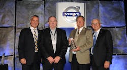 Chicago Truck owner Ron Meyering (second from right) and vice president Kevin Murtha (second from left) receive the 2014 Volvo Trucks North American Dealer of the Year award from (left) G&ouml;ran Nyberg, president, Volvo Trucks North American sales &amp; marketing and Terry Billings, Volvo Trucks vice president &ndash; business development (right).