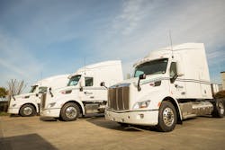 New Raven Transport LNG trucks outside Peterbilt Motors assembly plant in Denton Texas New Raven Transport LNG trucks outside Peterbilt Motors assembly plant in Denton Texas