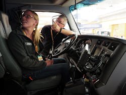 Attendees check out a Kenworth T680 tractor that PacLease brought to the exhibition hall to help show off available vehicle diagnostics systems View photo gallery from the conference Attendees check out a Kenworth T680 tractor that PacLease brought to the exhibition hall to help show off available vehicle diagnostics systems View photo gallery from the conference