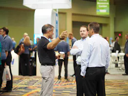 Attendees and exhibitors mingle at the TMW Transforum conference in Orlando FL where ALK Technologies announced that its navigation and routing technology has been certified for use with a number of TMW Systems39 software products Photo by Aaron Marsh Attendees and exhibitors mingle at the TMW Transforum conference in Orlando FL where ALK Technologies announced that its navigation and routing technology has been certified for use with a number of TMW Systems39 software products Photo by Aaron Marsh