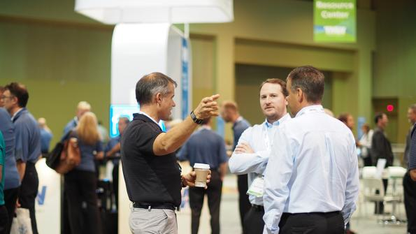 Attendees and exhibitors mingle at the TMW Transforum conference in Orlando FL where SkyBitz announced that its trailer and cargo tracking and information management system has been integrated with TMW Systems39 TruckMate software Photo by Aaron Marsh