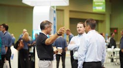 Attendees and exhibitors mingle at the TMW Transforum conference in Orlando, FL, where SkyBitz announced that its trailer and cargo tracking and information management system has been integrated with TMW Systems&apos; TruckMate software. (Photo by Aaron Marsh)