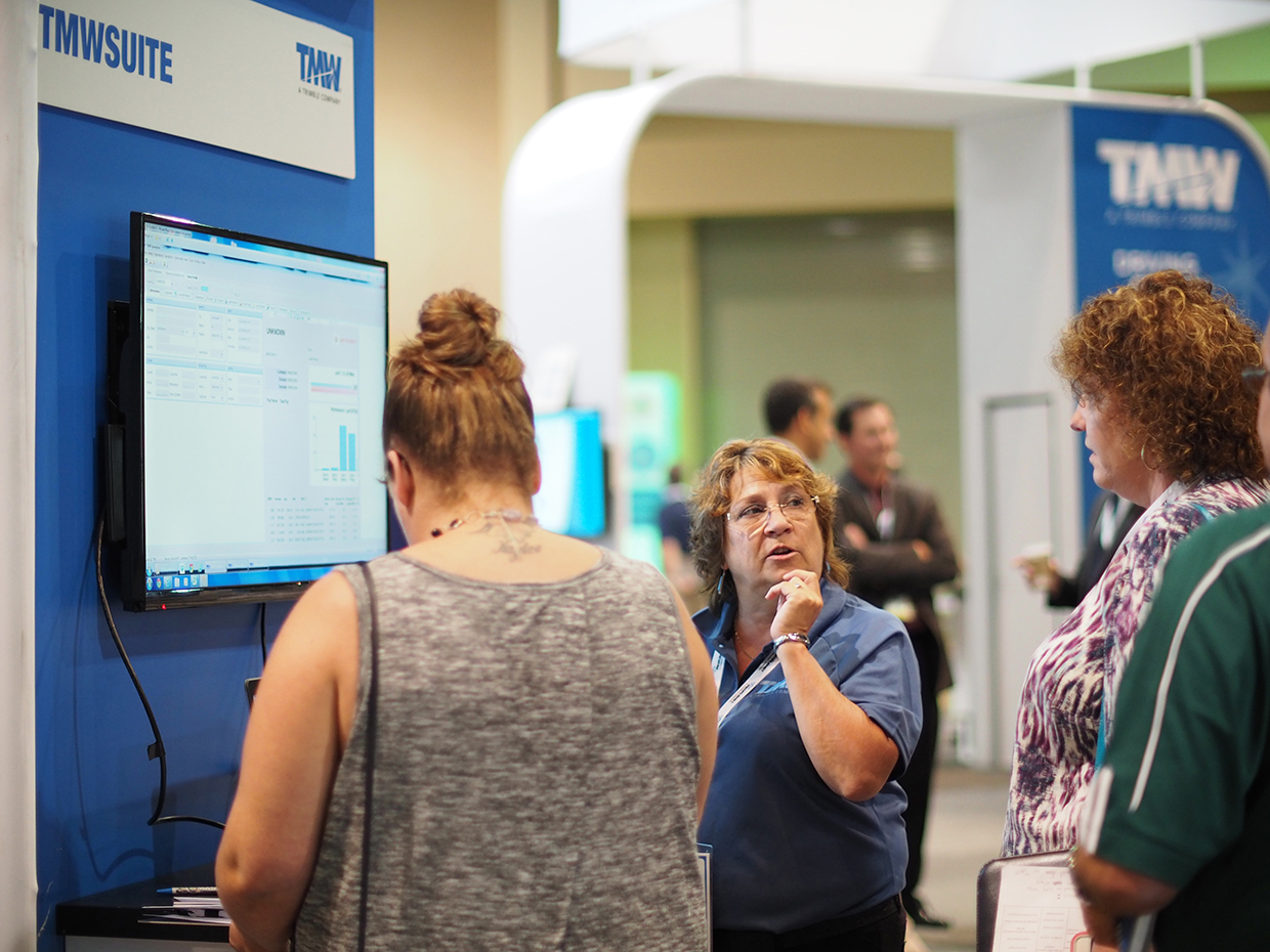 TMW Systems39 Barbara Ashcroft center shows attendees the company39s TMWSuite transportation management system Photo by Aaron Marsh