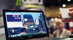 QuikQ demonstrated how its fleet fuel purchasing system works at the TMW Transforum in Orlando, FL. (Photo by Aaron Marsh)