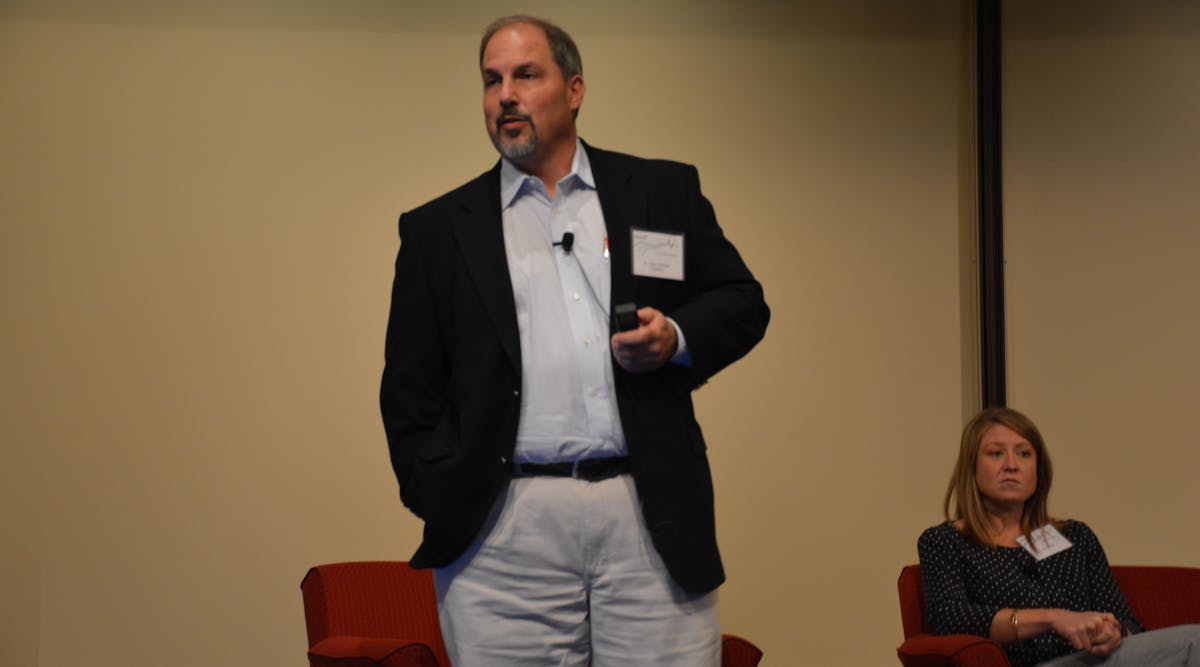 Adam Seidner, global medical director at Travelers, speaks at the insurance company&apos;s Third Annual Transportation Symposium. Erin Mabry, senior research associate at Virginia Tech, also spoke during the event.