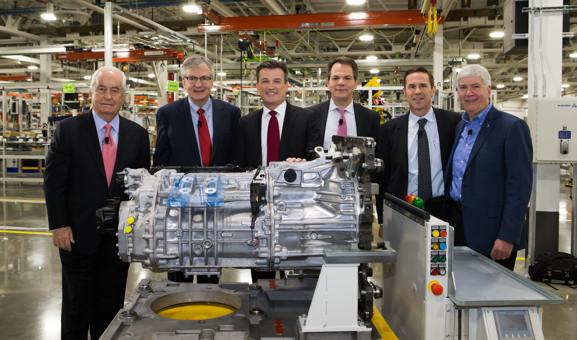 Marking start of DT12 production at the Detroit Powertrain Redford MI plant are left to right Roger Penske Martin Daum Werner Bernhard Frank Reintjes Jeff Allen and Rick Snyder