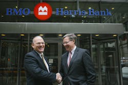 President and CEO of BMO Harris Bank David Casper right welcomes Dan Clark head of BMO Transportation Finance after the completion of BMOrsquos acquisition of GE Capital Corporationrsquos Transportation Finance business President and CEO of BMO Harris Bank David Casper right welcomes Dan Clark head of BMO Transportation Finance after the completion of BMOrsquos acquisition of GE Capital Corporationrsquos Transportation Finance business