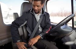 A photo showing a commercial truck driver buckling up from FMCSA39s Commercial Motor Vehicle Safety Belt Facts brochure A photo showing a commercial truck driver buckling up from FMCSA39s Commercial Motor Vehicle Safety Belt Facts brochure