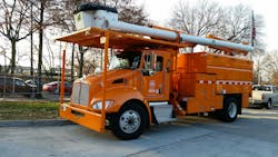This New York City dieselelectric hybrid forestry truck contains an electronic PTO that allows the boom to operate without the engine idling This New York City dieselelectric hybrid forestry truck contains an electronic PTO that allows the boom to operate without the engine idling