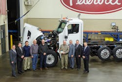 From left to right Charles Cook Peterbiltrsquos Marketing Manager for Vocational Products Rick Paul District Sales Manager Ron Augustyn Peterbiltrsquos Denton TX Plant Manager Randy Kephart Knife River Equipment Manager Scott Hammond Knife River Northwest Region Equipment Manager Colin Milligan Knife River Shop Manager Robert Woodall Peterbiltrsquos Asst GMSales and Marketing Leon Handt Peterbiltrsquos Asst GMOperations and Jim Zito Peterbiltrsquos Director of Sales for Vocational Products Photo courtesy o From left to right Charles Cook Peterbiltrsquos Marketing Manager for Vocational Products Rick Paul District Sales Manager Ron Augustyn Peterbiltrsquos Denton TX Plant Manager Randy Kephart Knife River Equipment Manager Scott Hammond Knife River Northwest Region Equipment Manager Colin Milligan Knife River Shop Manager Robert Woodall Peterbiltrsquos Asst GMSales and Marketing Leon Handt Peterbiltrsquos Asst GMOperations and Jim Zito Peterbiltrsquos Director of Sales for Vocational Products Photo courtesy o