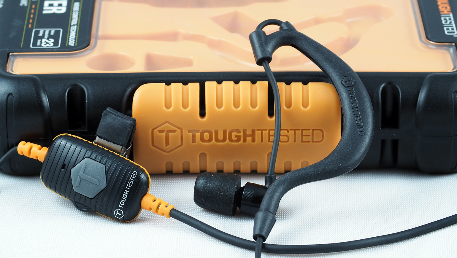 The ToughTested Safe Driving Mono Earbud is a wired phone earpiece with noise reduction and several features like Kevlar reinforcement and dustmoisture resistance designed to help it stand up to harsher environments