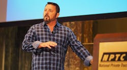 Former U.S. Navy SEALs sniper and author of SEAL Team Six Howard Wasdin speaks to attendees at the opening session of NPTC&apos;s Annual Conference.