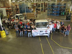 The folks at Isuzu celebrate the production of the 30000th gasolinepowered NSeries truck at the Spartan Motors facility in Charlotte MI The folks at Isuzu celebrate the production of the 30000th gasolinepowered NSeries truck at the Spartan Motors facility in Charlotte MI