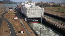 A cargo ship makes its way through the Miraflores locks as it crosses the Panama Canal on April 7, 2016 in Panama City, Panama. A third lane, part of the $5.3 billion Panama Canal expansion project, opened June 26.