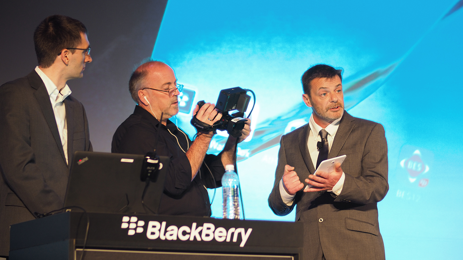 quotWhite hatquot hackers Campbell Murray at right and Fraser Winterborn far left demonstrate at the BlackBerry Security Summit how engineering flaws and lack of forethought in IoT devices can essentially give cybercriminals a back door into a secure wireless network mdash and possibly allow them to leave no detectable trace they were ever there