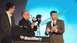 quotWhite hatquot hackers Campbell Murray at right and Fraser Winterborn far left demonstrate at the BlackBerry Security Summit how engineering flaws and lack of forethought in IoT devices can essentially give cybercriminals a back door into a secure wireless network mdash and possibly allow them to leave no detectable trace they were ever there quotWhite hatquot hackers Campbell Murray at right and Fraser Winterborn far left demonstrate at the BlackBerry Security Summit how engineering flaws and lack of forethought in IoT devices can essentially give cybercriminals a back door into a secure wireless network mdash and possibly allow them to leave no detectable trace they were ever there