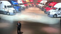 DTNA president and CEO Martin Daum unveils 12 next-gen 2018 Freightliner Cascadia being delivered to the company&apos;s 12 largest fleet customers.