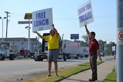 Arkansas Trucking Assn Chairman Butch Rice and Gary Jaworski a member of the Arkansas Road Team direct traffic to Thursday39s Driver Appreciation Day picnic Arkansas Trucking Assn Chairman Butch Rice and Gary Jaworski a member of the Arkansas Road Team direct traffic to Thursday39s Driver Appreciation Day picnic