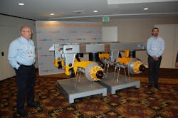 SAFHolland39s Bill Hicks left and Roger Jansen right show off the company39s new CBX40 AeroBeam tandem axle trailer suspension Photo by Sean KilcarrFleet Owner SAFHolland39s Bill Hicks left and Roger Jansen right show off the company39s new CBX40 AeroBeam tandem axle trailer suspension Photo by Sean KilcarrFleet Owner