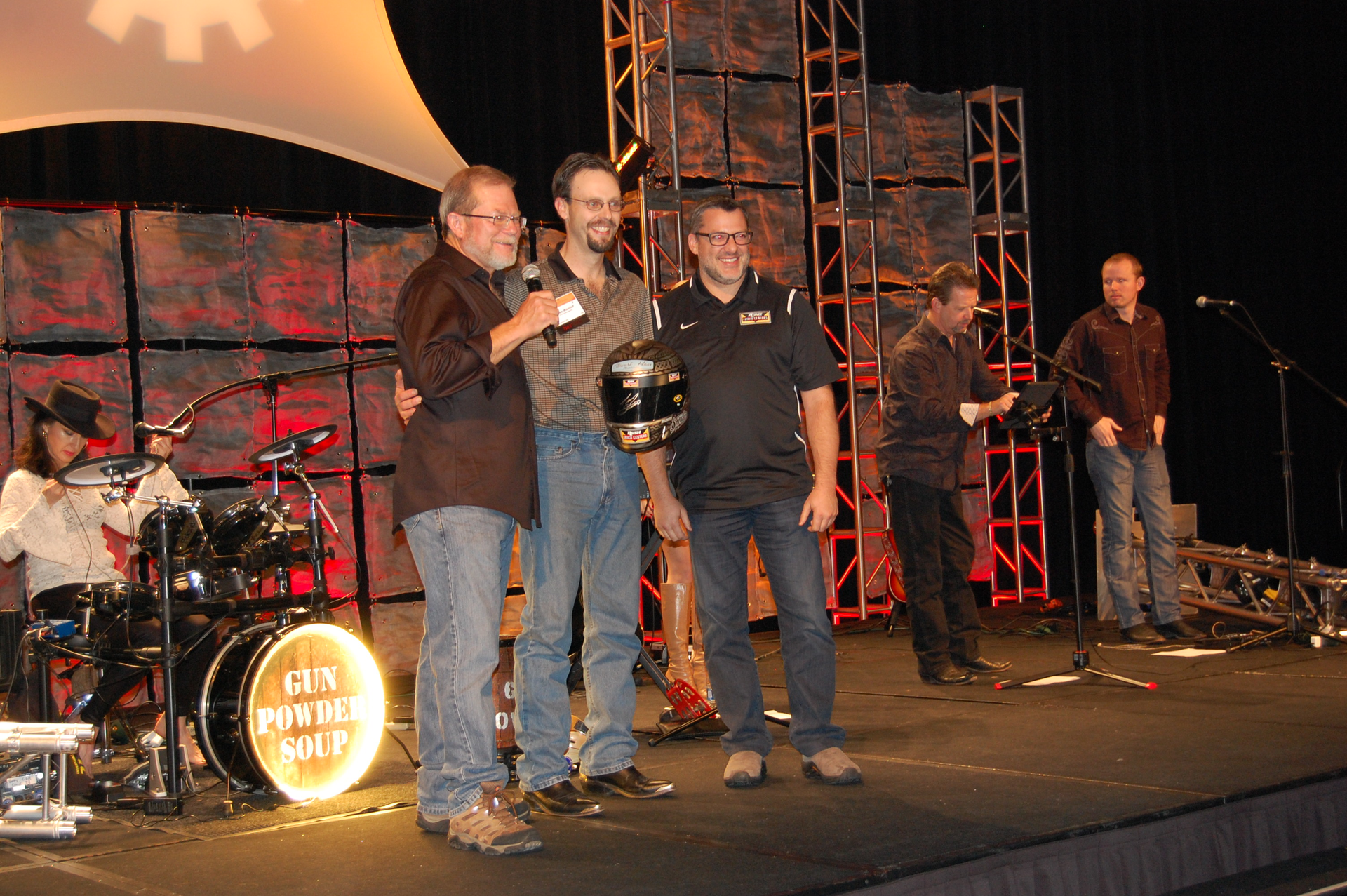 Allaround champion Lucas Manlief center flanked by Rusty Rush left chairman president and CEO of Rush Enterprises and famed NASCAR Driver Tony Stewart right Photo by Sean Kilcarr for Fleet Owner