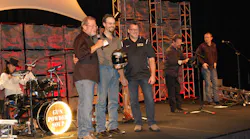 Allaround champion Lucas Manlief center flanked by Rusty Rush left chairman president and CEO of Rush Enterprises and famed NASCAR Driver Tony Stewart right Photo by Sean Kilcarr for Fleet Owner