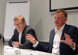 Navistar President and CEO Troy Clarke left and VW Truck amp Bus head Andreas Renschler speak during a conference at IAA 2016 Navistar President and CEO Troy Clarke left and VW Truck amp Bus head Andreas Renschler speak during a conference at IAA 2016