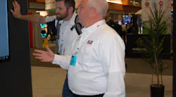 Rush39s Brian Mulshine explaining the new links to Cummins and Peterbilt that will soon be available through the RushCare Service Connect platform Photo by Sean Kilcarr for Fleet Owner