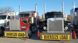 A truck and trailer weighing more than 80,000 lbs. or having a width of more than 102 in. would meet the federal definition of oversize/overweight freight. (Photo by Sean Kilcarr for Fleet Owner)