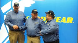 David Webb, center, winner of this year&apos;s Goodyear Highway Hero award, shares the spotlight with fellow truck driver finalists Chris Baker, right, and Tim Freiburger.