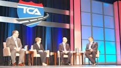 Newly-elected TCA Chairman Rob Penner (far right) who is also president and CEO of Bison Transportaed moderates a panel discussion on autonomous trucks. (Photo by Sean Kilcarr for Fleet Owner)