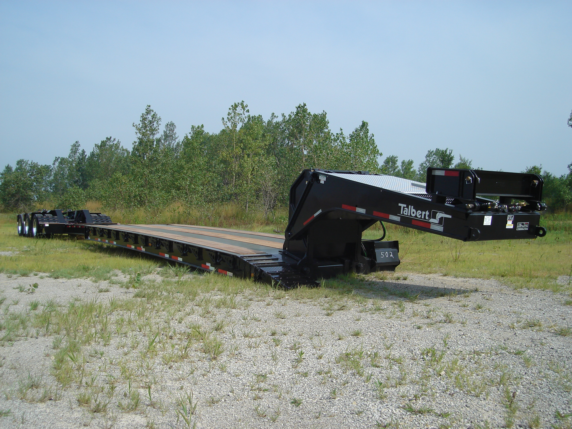 Talbert Manufacturingrsquos new 55ton extendable trailer the 55SATELE can be retracted from 53 to 32 ft 6 in