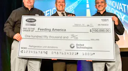 Tom Ondo left vice president amp general manager Americas TruckTrailerRail and Jon Shaw right director Global Communications amp Sustainability Carrier Transicold amp Refrigeration Systems present a 150000 check to Bill Thomas chief supply chain officer Feeding America for the donation and installation of transport refrigeration units to seven Feeding America member food banks across the US
