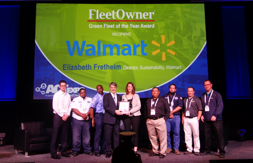 Elizabeth Fretheim center and Walmart associates receive the 2017 Fleet Owner Green Fleet of the Year from editor emeritus Jim Mele at ACT Expo in Long Beach CA