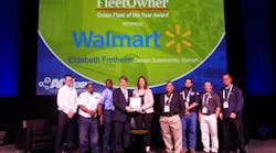 Elizabeth Fretheim (center) and Walmart associates receive the 2017 Fleet Owner Green Fleet of the Year from editor emeritus Jim Mele at ACT Expo in Long Beach, CA.