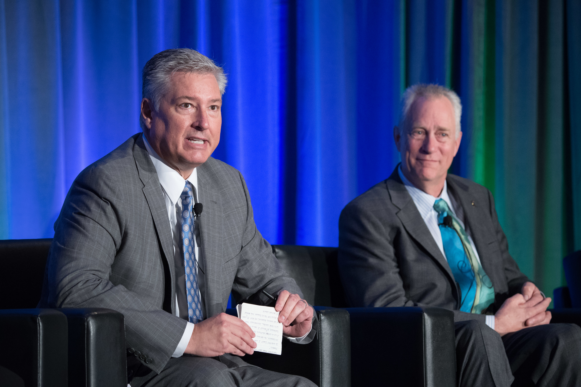 Navistar39s Steve Gilligan left and Kenworth39s Brian Lindgren talk fuel economy trade and alternative fuels during a panel discussion at the ACT Expo Photo ACT EXPO