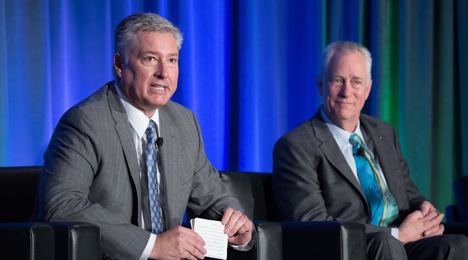 Navistar&apos;s Steve Gilligan (left) and Kenworth&apos;s Brian Lindgren talk fuel economy, trade, and alternative fuels during a panel discussion at the ACT Expo. (Photo: ACT EXPO)