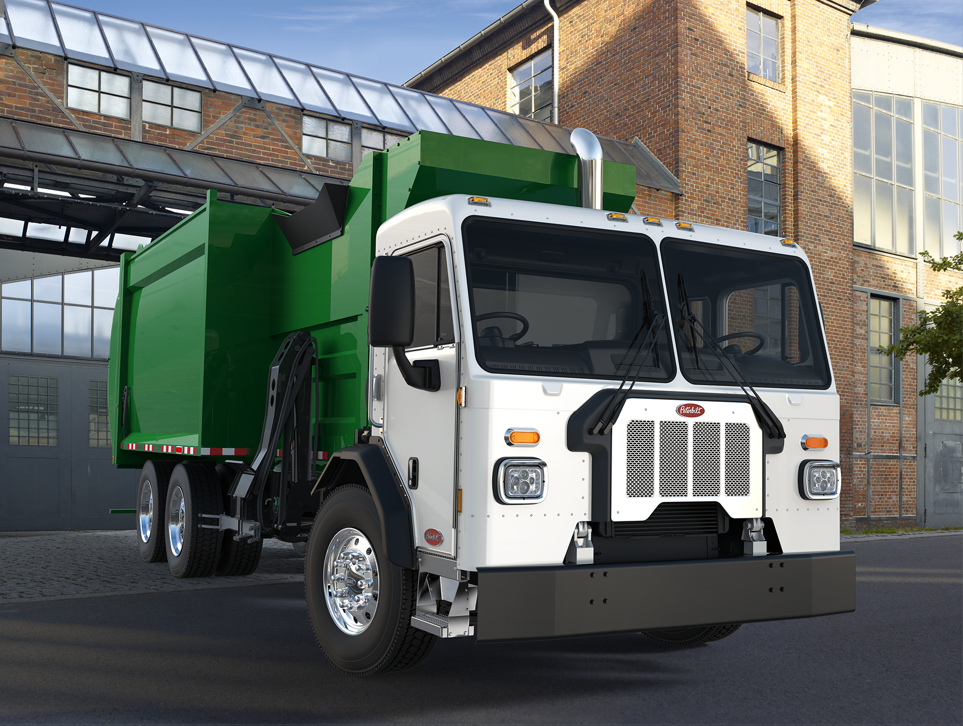 A batteryelectric drive equipped version of a Model 520 refuse truck like the one seen here is now being tested Photo Peterbilt