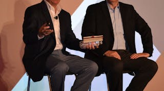 Thom Albrecht, left, with Transplace CEO Tom Sanderson at this year&apos;s Shipper Symposium, explained that Amazon and e-commerce is turning the truckload world &apos;upside down.&apos;