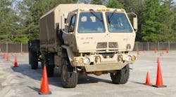 A soldier in the U.S. Army navigates through a set of cones during a truck rodeo in April. (Photo: Sgt. Kyle Fisch/U.S. Army)