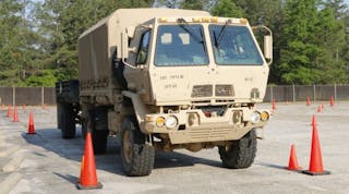 A soldier in the U.S. Army navigates through a set of cones during a truck rodeo in April. (Photo: Sgt. Kyle Fisch/U.S. Army)